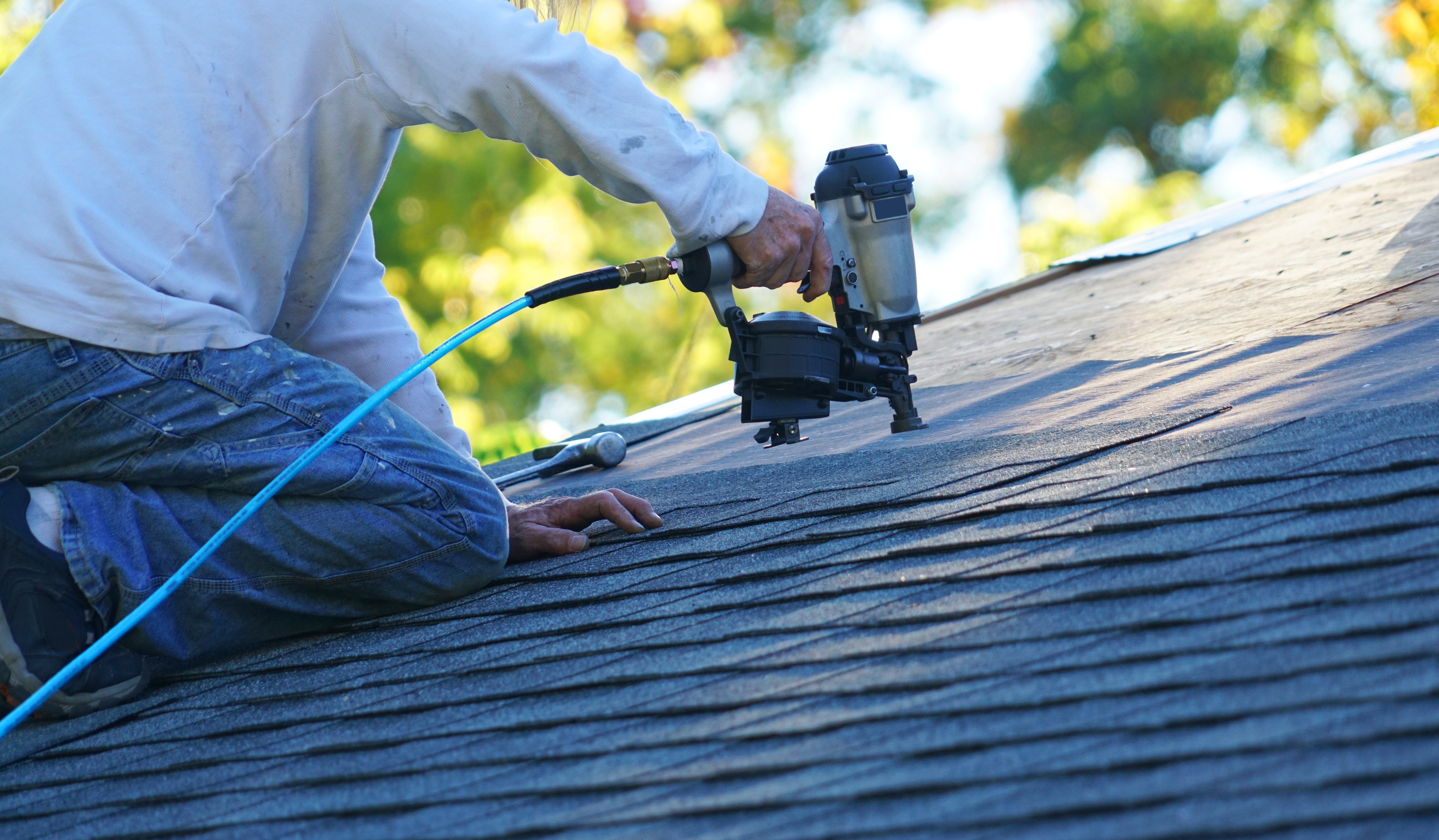 Roofer nail gun re-roof